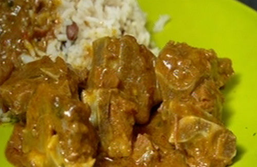 Curried goat with rice and