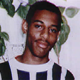  The Old Bailey hears that two men accused of murdering Stephen Lawrence were photographed by a police officer just days afer his death, despite previous claims that they did not know one another