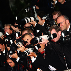 A large group of press photographers taking pictures (Getty) 