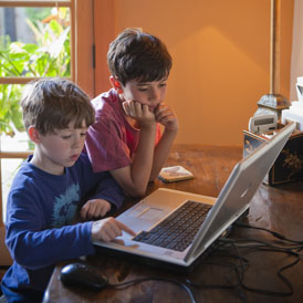 Children surfing the internet (Getty)