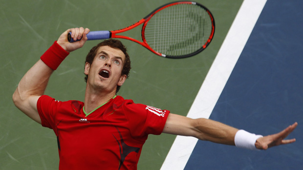 Andy Murray serves to Donald Young during their match at the US Open