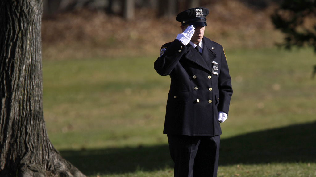 Newtown shooting: Christmas spirit allows police a day off (R)