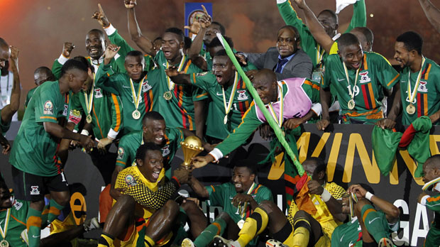 The Zambian football squad celebrates winning the Africa Cup of Nations (Reuters)