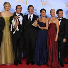 The cast of The Artist including best actor winner Jean Dujardin and Uggie the dog (Reuters)