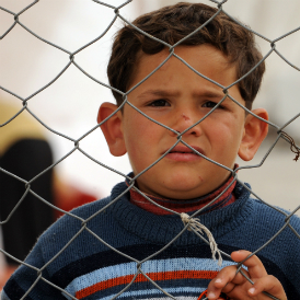 A young Syrian boy in a refugee camp. (Getty)