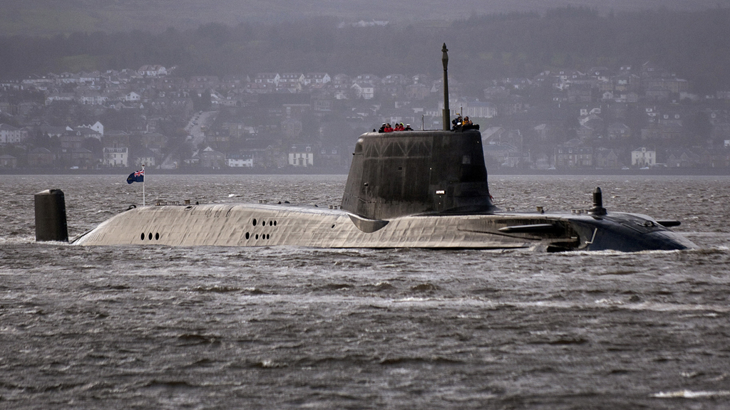 A file photo taken on November 20, 2009, shows the British Royal Navy's nuclear submarine, HMS Astute, en-route to her new base Faslane, on the Firth of Cylde south-west Scotland (Getty)