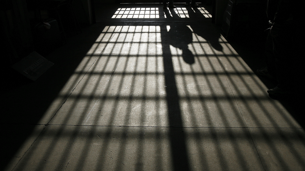 The number of inmates will remain near record levels for six years after a government U-turn on sentencing reforms, Whitehall's spending watchdog warns.