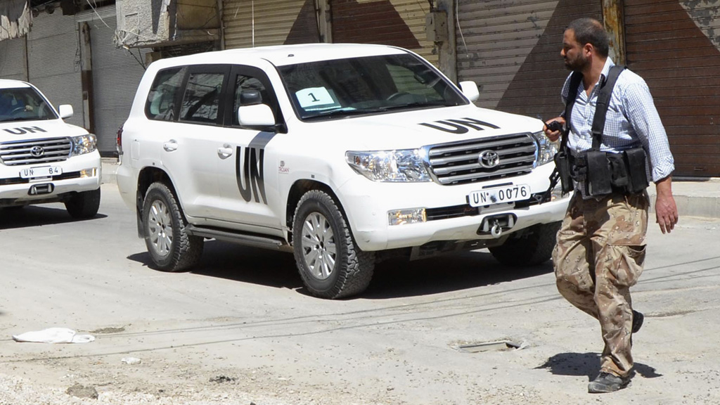 UN chemical weapons inspectors in Damascus (picture: Reuters)