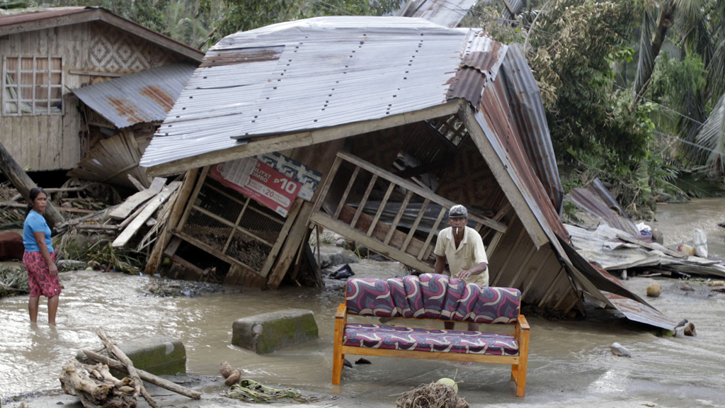 A damaged home caused by Cyclone Bopha in the Philippines (picture: Reuters)