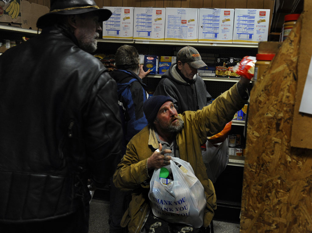 Residents at a food bank in Rhode Island, US (Getty)