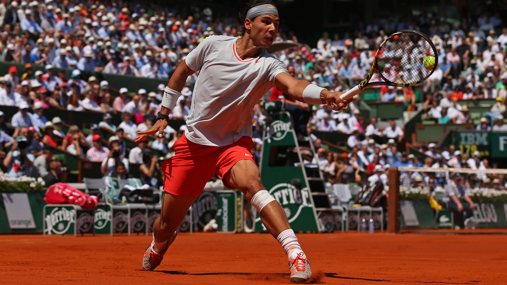 In a classic five-set semi-final, Spain's Rafael Nadal defeats world number one Novak Djokovic in Paris to reach his eighth French Open tennis final.