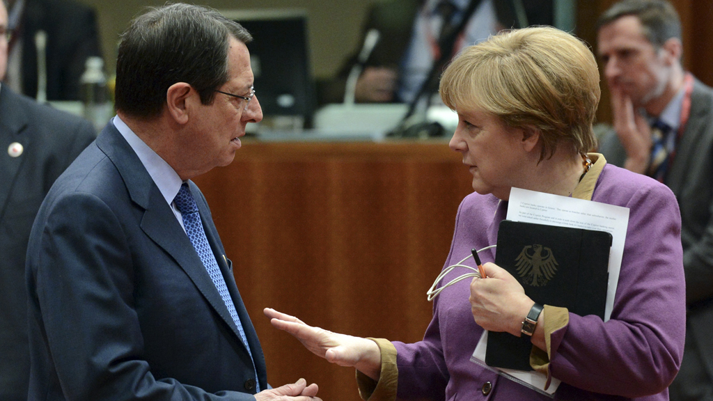 Cyprus' President Nicos Anastasiades with German Chancellor Angela Merkel at bailout talks on Friday (picture: Reuters)