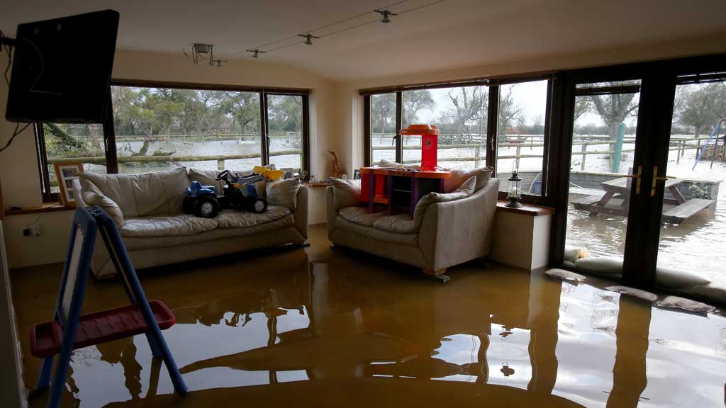 It is not yet clear how much it will cost to repair homes damaged by floods in the West Country and Thames Valley, but the bill will be substantial - and insurance premiums may rise (Getty)