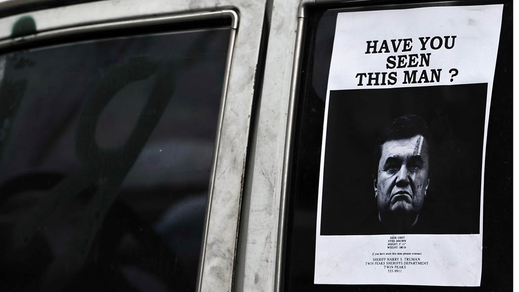 Ousted President Viktor Yanukovych as seen on a 'wanted' poster