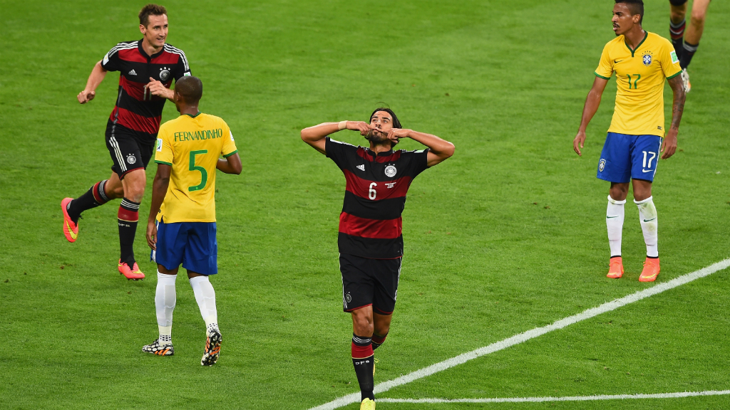 Sam's town: Germany's Sami Khedira celebrates with teammates after scoring Germany's fifth goal. (Getty)