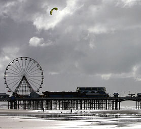 A man flies a kite on Blackpool beach, near where Shale gas has been discovered. 