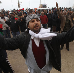 Protesters against the Libyan leader Gaddafi chant slogans during a demo in Benghazi. (Reuters)