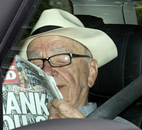Rupert Murdoch arrives in the UK, facing calls to drop his BSkyB bid (Image: Getty)
