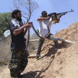Rebel fighters pushing towards Zlitan (Reuters)