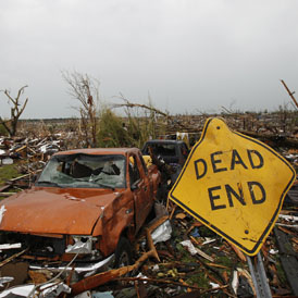 The tornado flattened entire neighbourhoods, uprooted trees and flipped over cars and trucks. about 2,000 homes and many other businesses, schools and other buildings were destroyed.