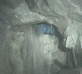 A frame grab shows the drill bit of the T-130 drilling machine after digging a 28-inch escape hole near Copiaco. (Reuters)