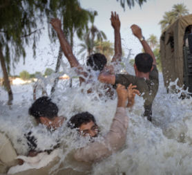 Pakistan floods: rising waters as aid is slow to reach survivors. (Reuters)