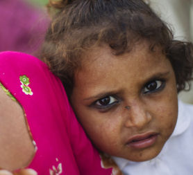 Two young flood victims look on at a relief camp in Nowshera. (Reuters)