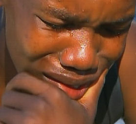 Haiti: a young man cries